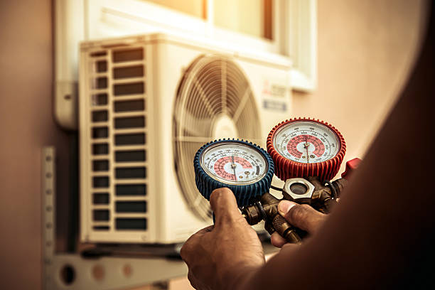 Professional Heat Pump Repair technician working in Branford, CT